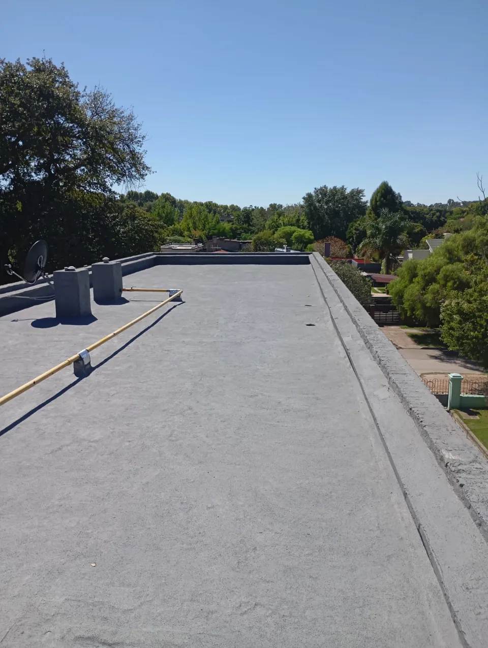Azotea del edificio en Colón terminada con Microgoma gris